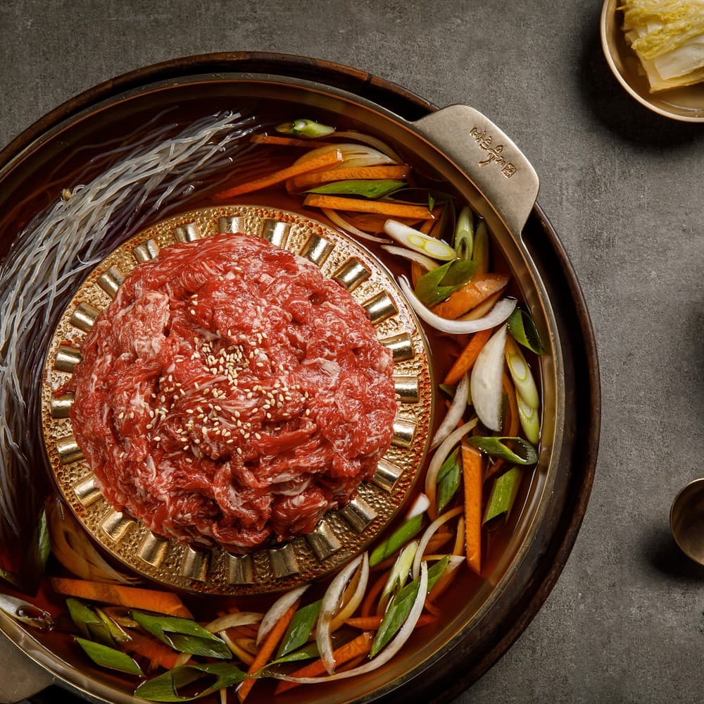 온누리전통시장) 주왕산가든 명품 한우불고기 750g 불고기 육수 야채 포함 18,320원
