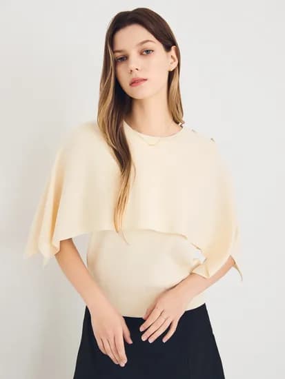 아이잗컬렉션 케이프 풀오버 니트 84,660원