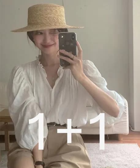 1+1 엘로디 프릴펀칭블라우스 24,300원 무배