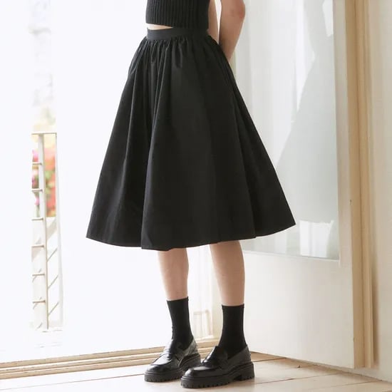 롯데온) 라르고 플리츠 스커트 블랙 42,550원